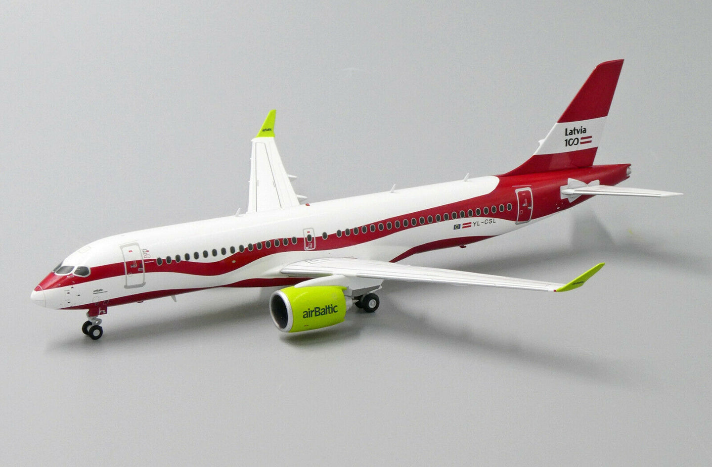 JC WINGS A220 AIR BALTIC "LATVIA 100TH LIVERY" REG: YL-CSL