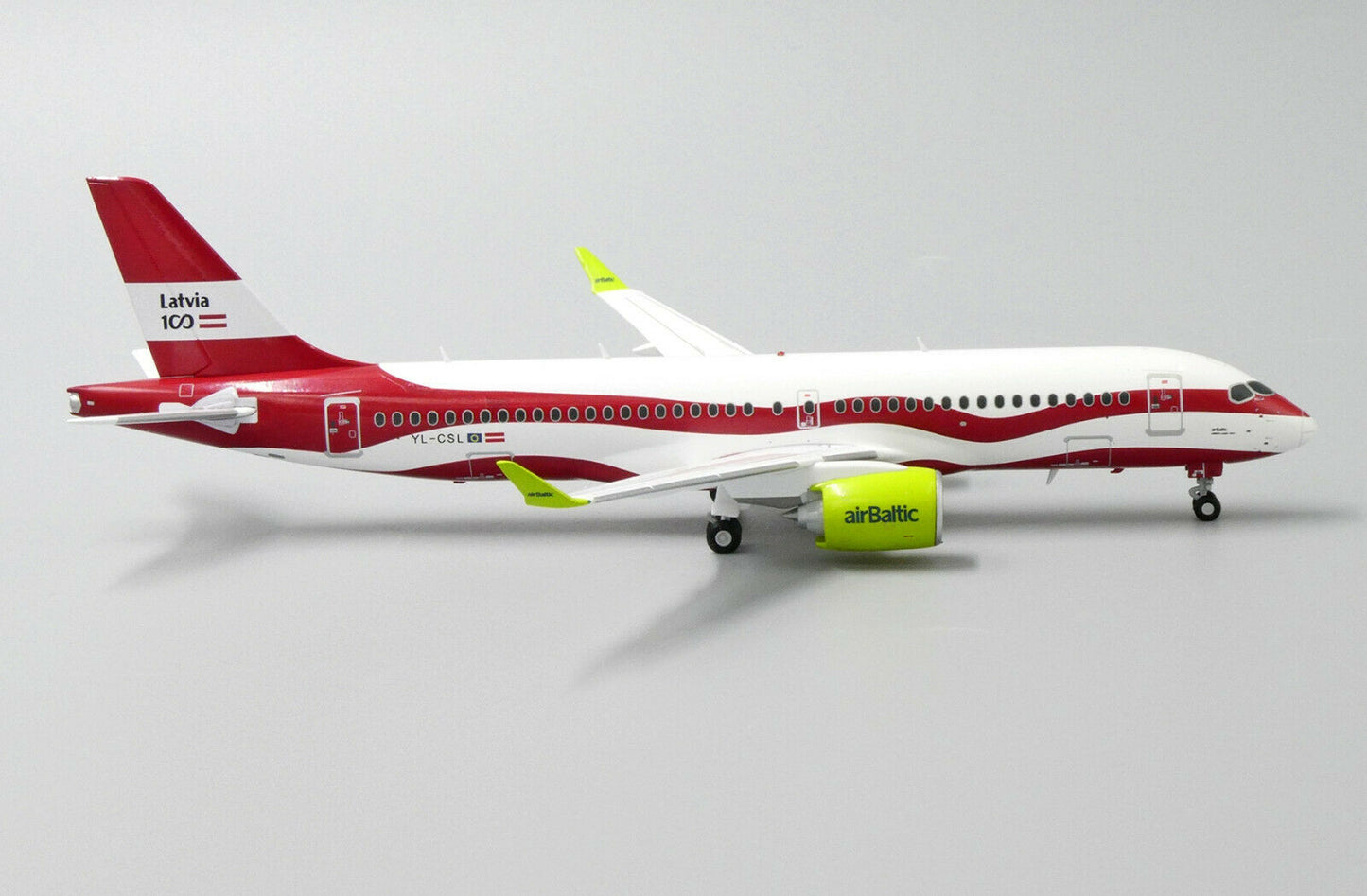 JC WINGS A220 AIR BALTIC "LATVIA 100TH LIVERY" REG: YL-CSL