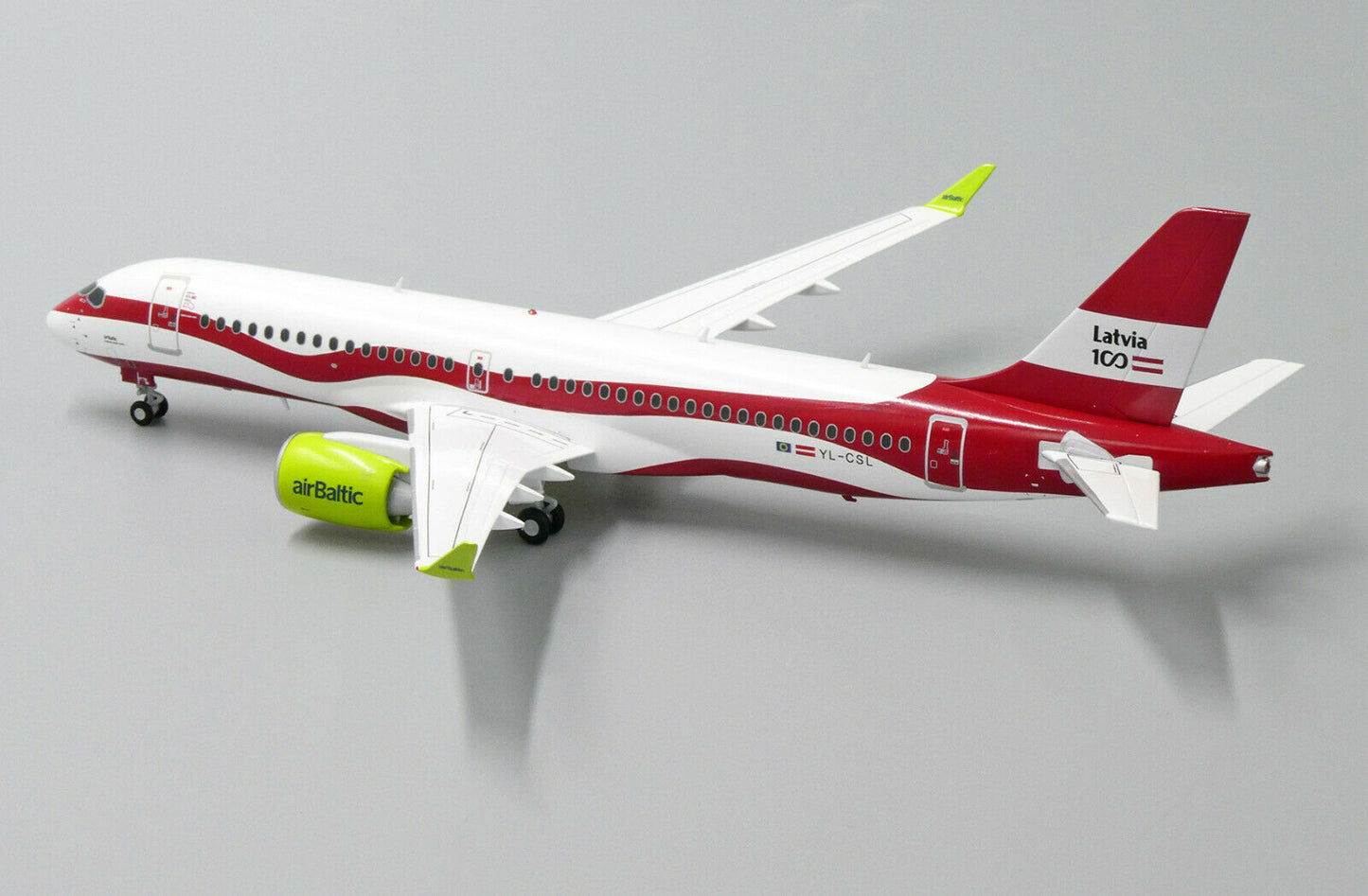 JC WINGS A220 AIR BALTIC "LATVIA 100TH LIVERY" REG: YL-CSL