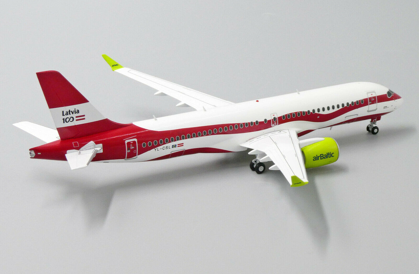 JC WINGS A220 AIR BALTIC "LATVIA 100TH LIVERY" REG: YL-CSL
