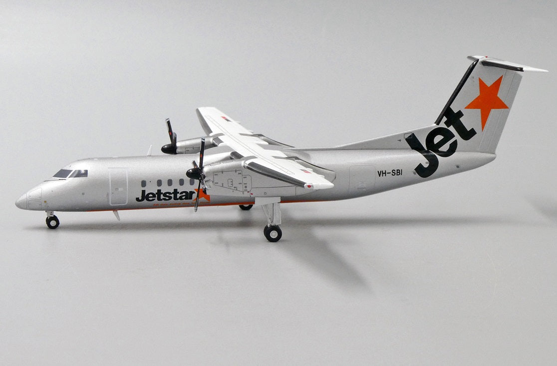 JC WINGS DASH8-Q300 JETSTAR AIRWAYS REG: VH-SBI