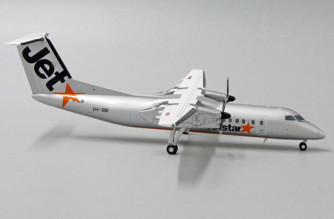 JC WINGS DASH8-Q300 JETSTAR AIRWAYS REG: VH-SBI