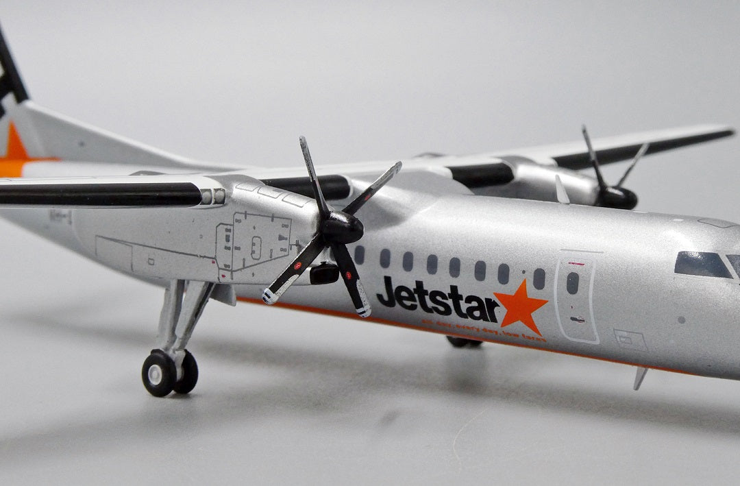 JC WINGS DASH8-Q300 JETSTAR AIRWAYS REG: VH-SBI