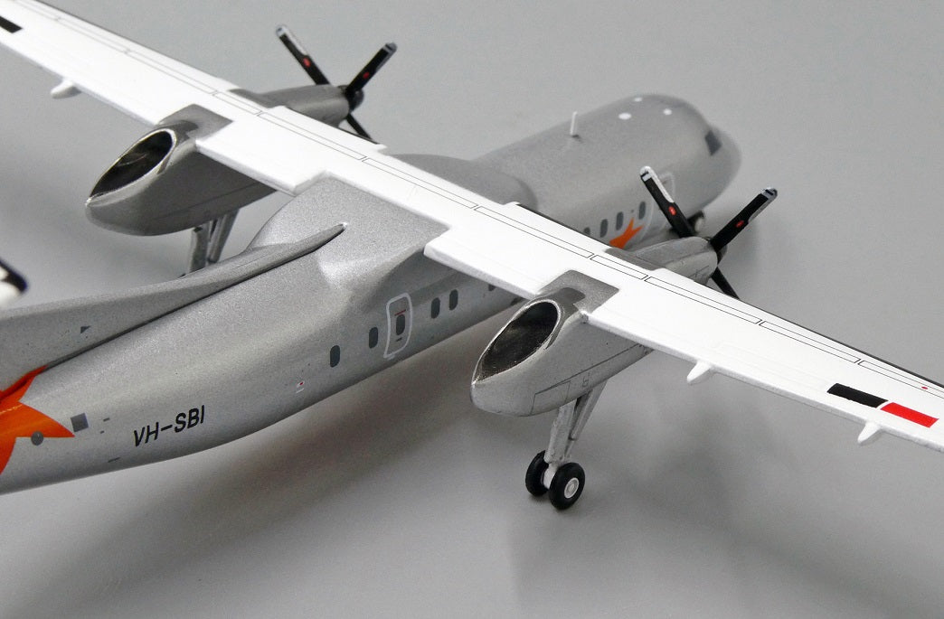 JC WINGS DASH8-Q300 JETSTAR AIRWAYS REG: VH-SBI