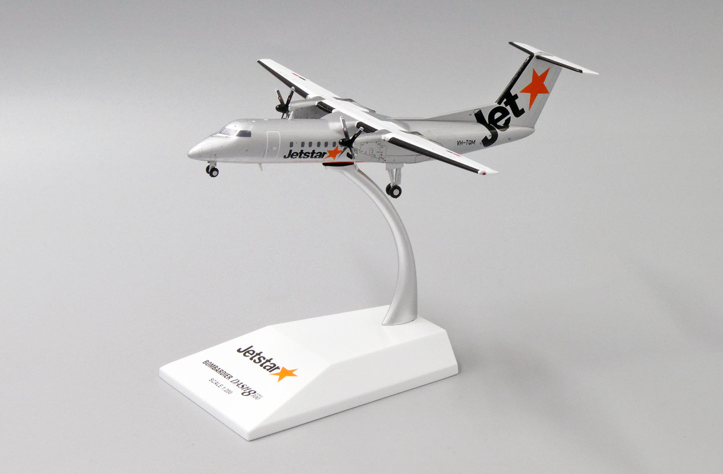 JC WINGS DASH8-Q300 JETSTAR AIRWAYS REG: VH-TQM