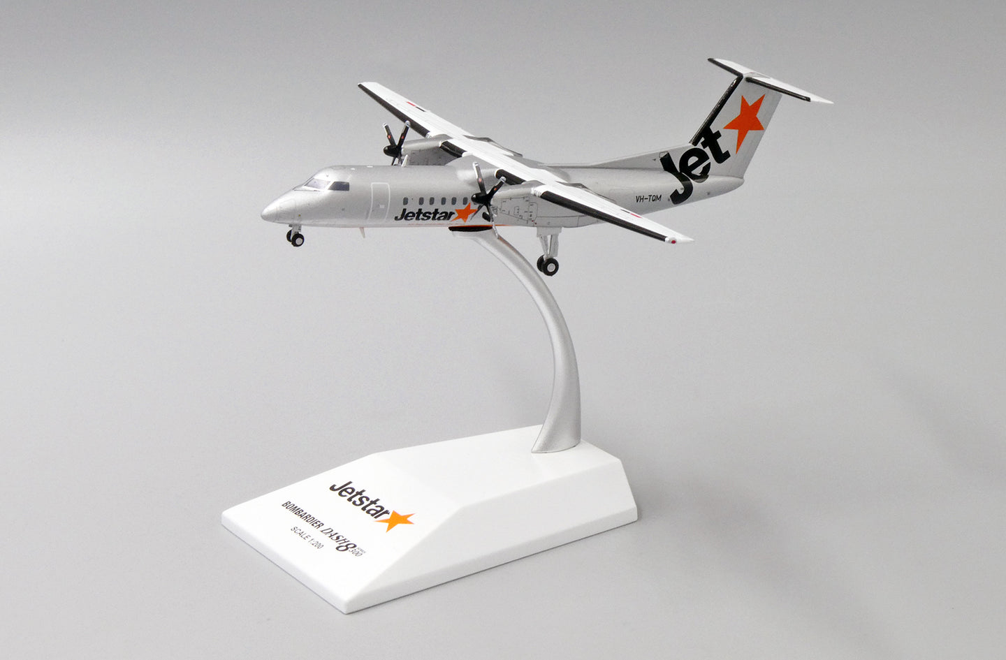 JC WINGS DASH8-Q300 JETSTAR AIRWAYS REG: VH-TQM