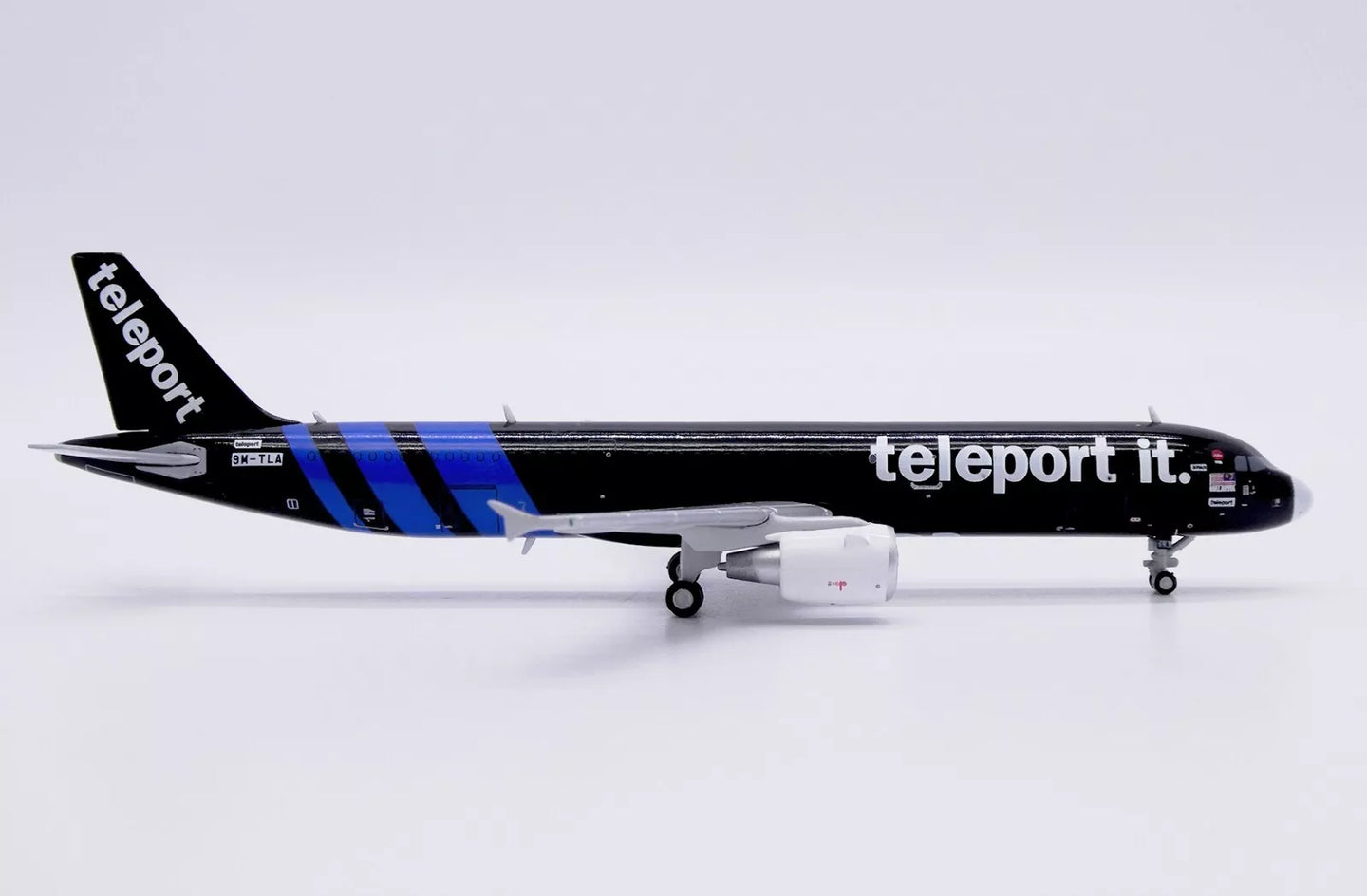 JC WINGS A321-200P2F TELEPORT (AIRASIA) REG: 9M-TLA