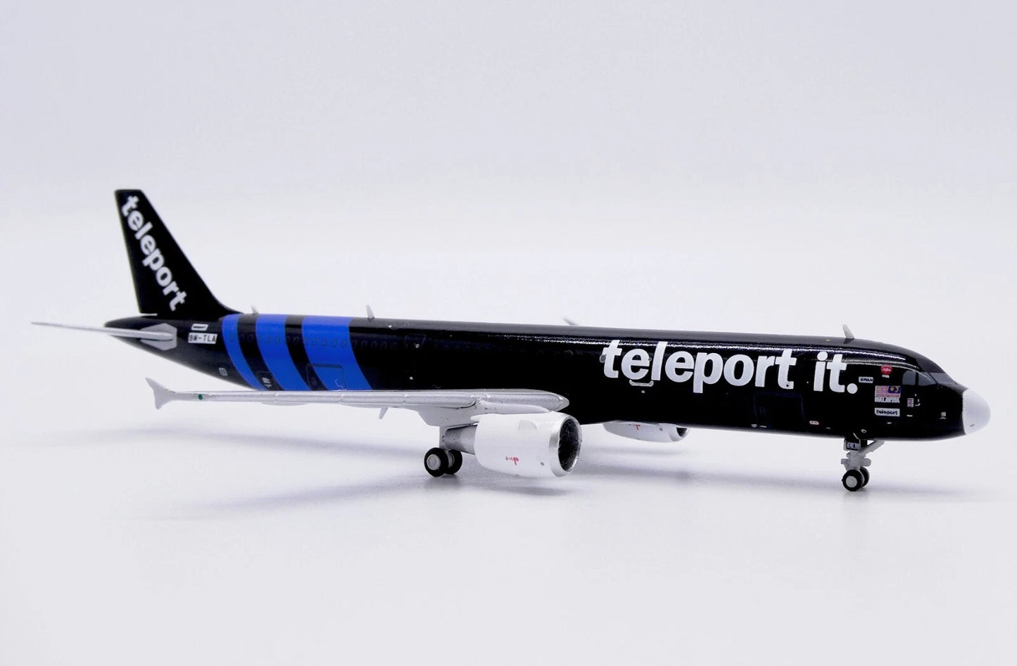 JC WINGS A321-200P2F TELEPORT (AIRASIA) REG: 9M-TLA