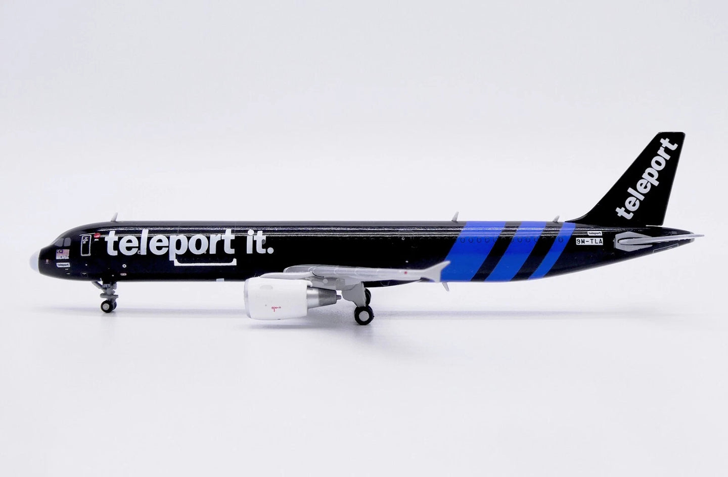 JC WINGS A321-200P2F TELEPORT (AIRASIA) REG: 9M-TLA