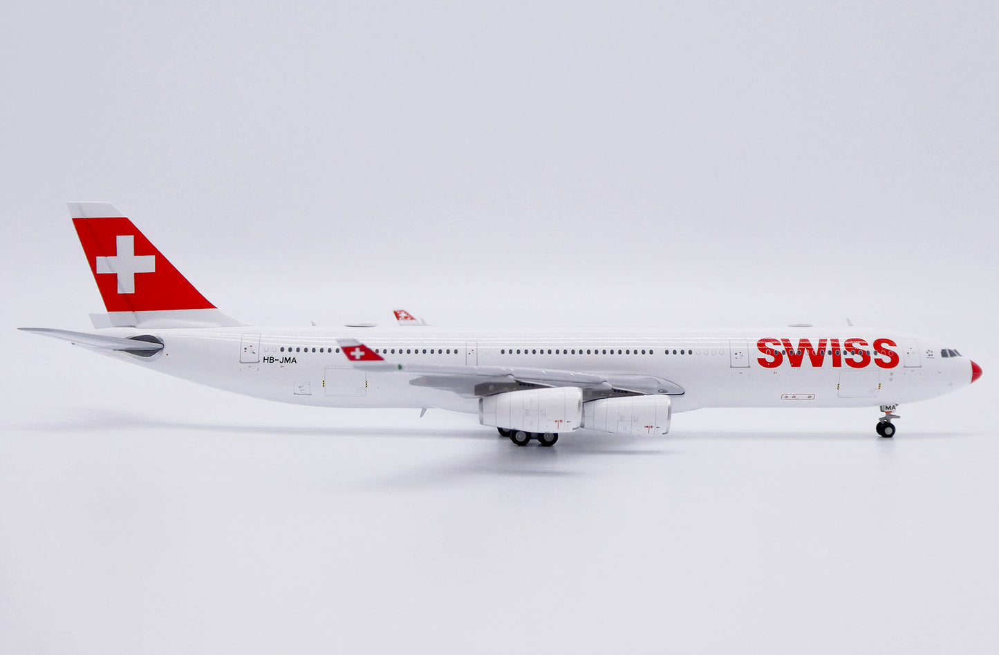 JC WINGS A340-300 SWISS "RED NOSE" REG: HB-JMA