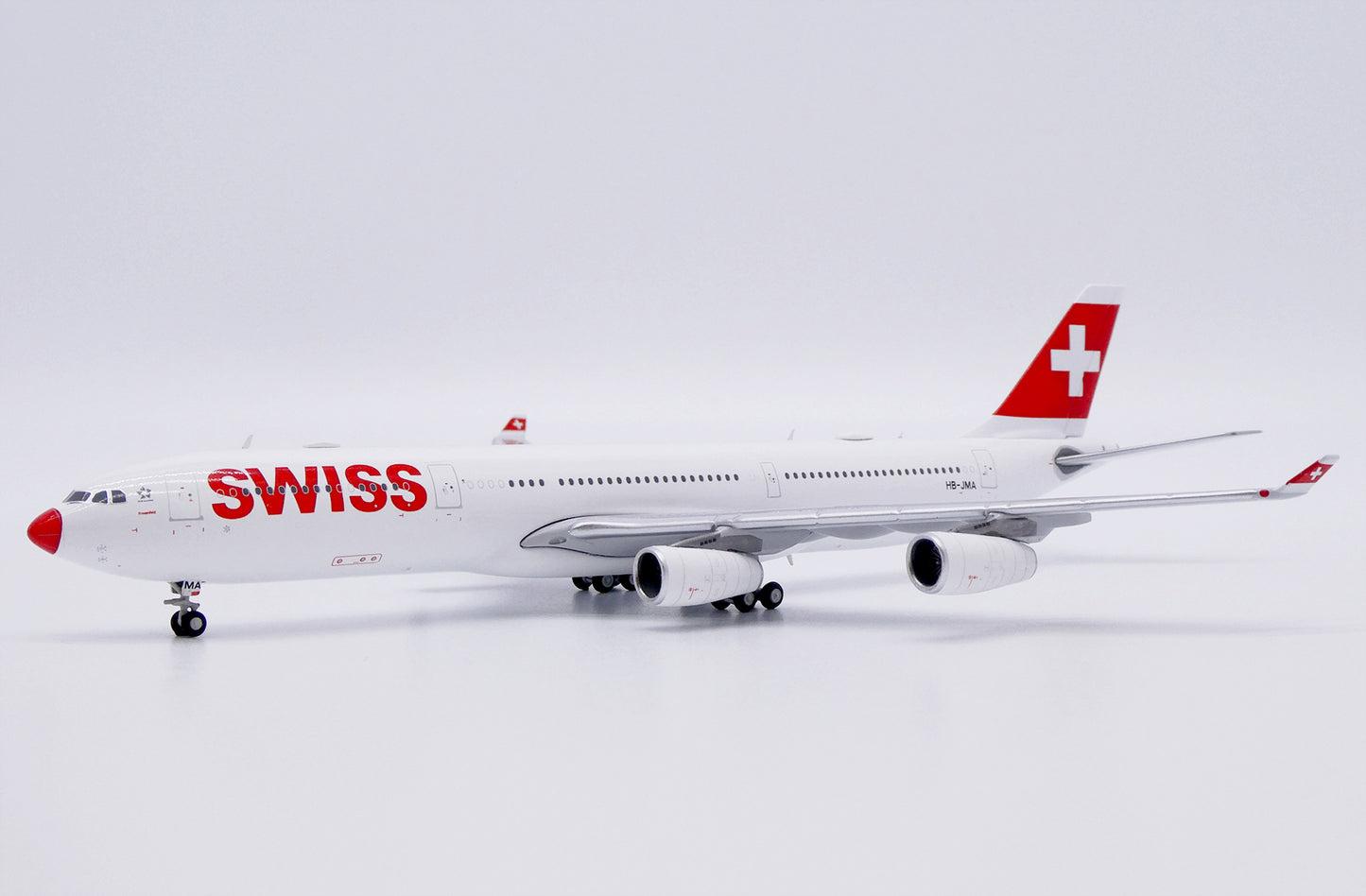 JC WINGS A340-300 SWISS "RED NOSE" REG: HB-JMA