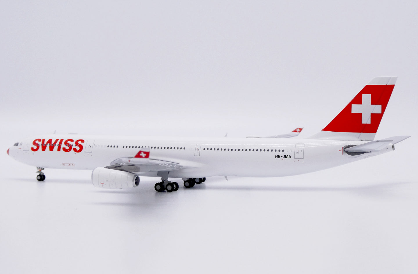 JC WINGS A340-300 SWISS "RED NOSE" REG: HB-JMA