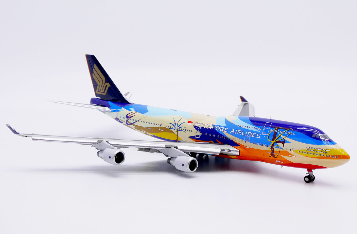 JC WINGS B747-400 SINGAPORE AIRLINES "TROPICAL" (FLAPS DOWN ) REG: 9V-SPK