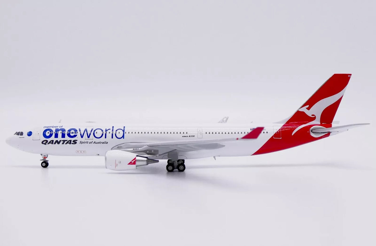 JC WINGS A330-200 QANTAS "ONEWORLD" REG: VH-EBV