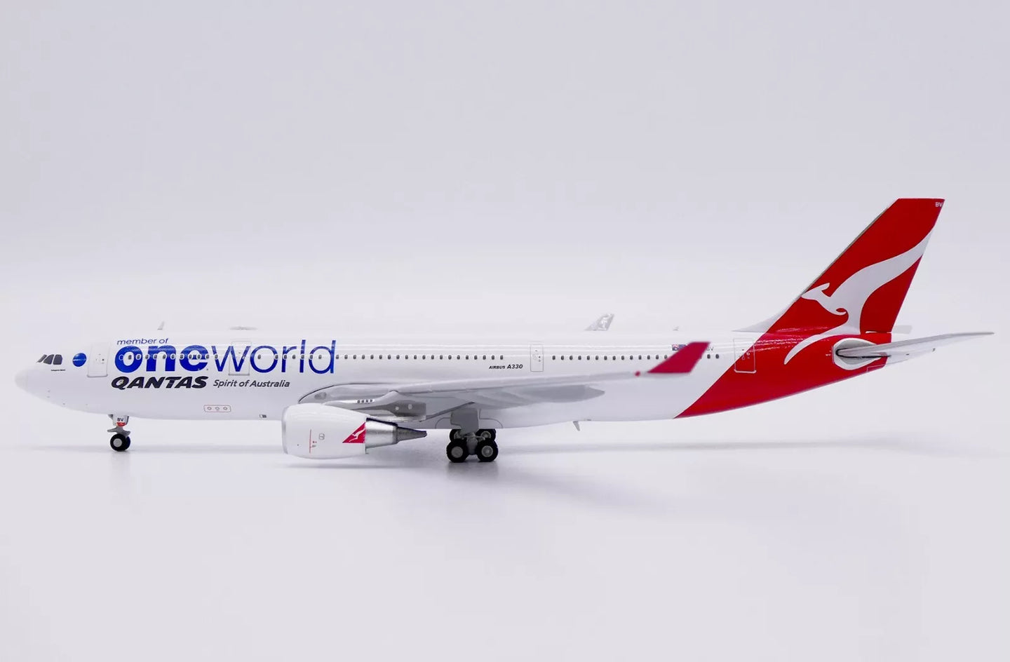 JC WINGS A330-200 QANTAS "ONEWORLD" REG: VH-EBV