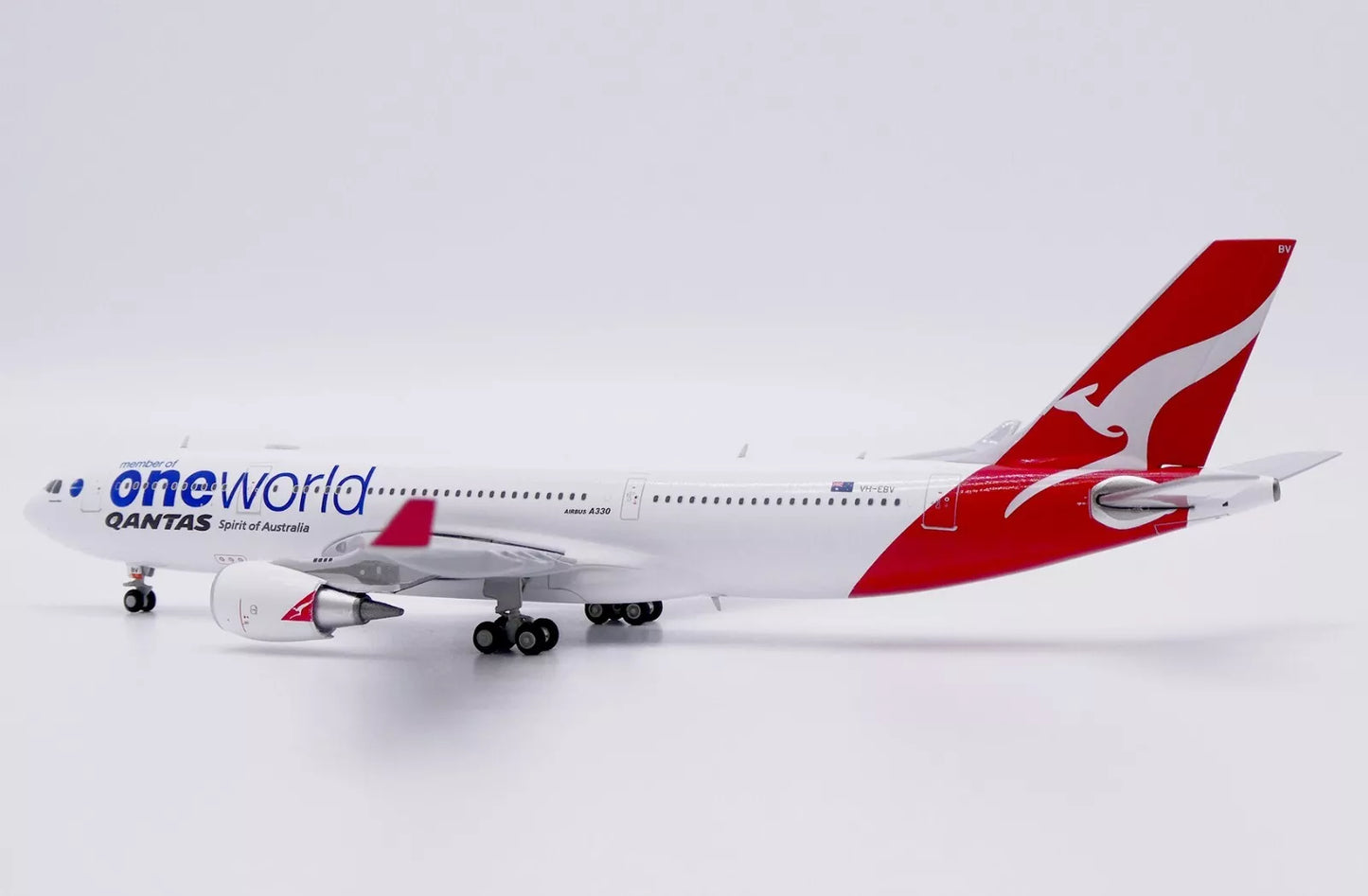JC WINGS A330-200 QANTAS "ONEWORLD" REG: VH-EBV