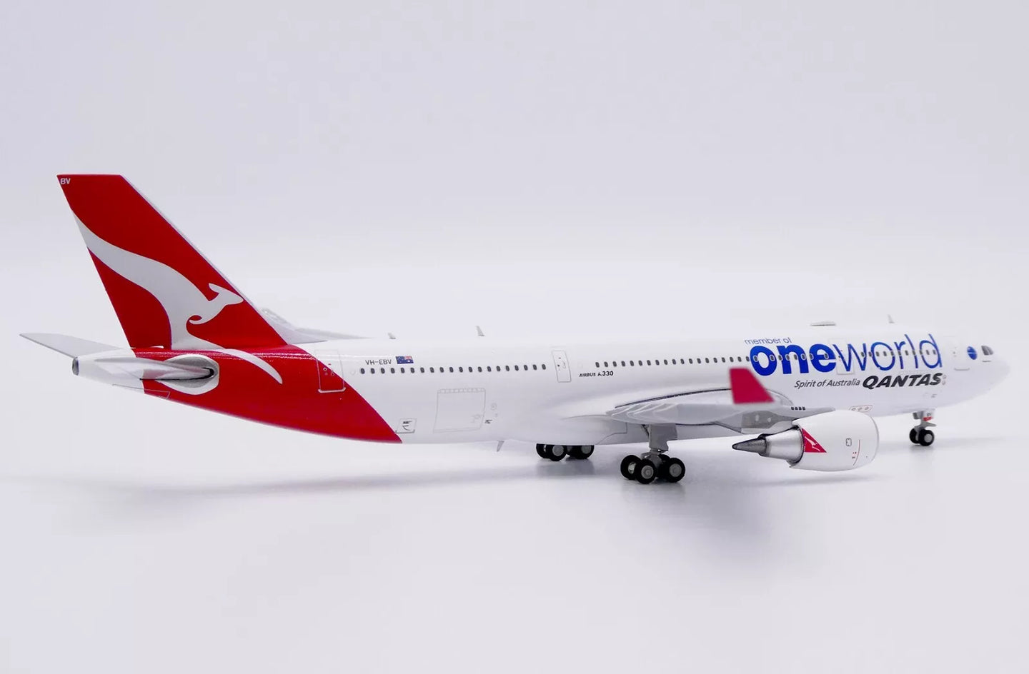 JC WINGS A330-200 QANTAS "ONEWORLD" REG: VH-EBV
