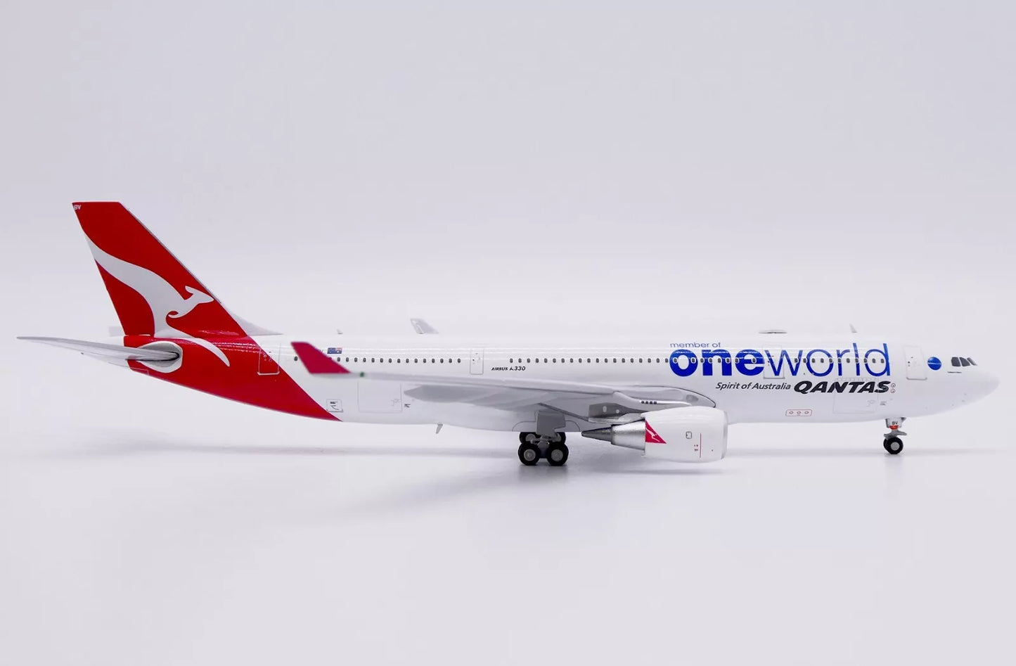 JC WINGS A330-200 QANTAS "ONEWORLD" REG: VH-EBV