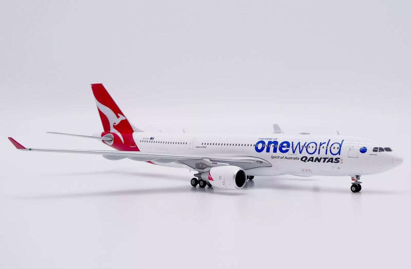 JC WINGS A330-200 QANTAS "ONEWORLD" REG: VH-EBV