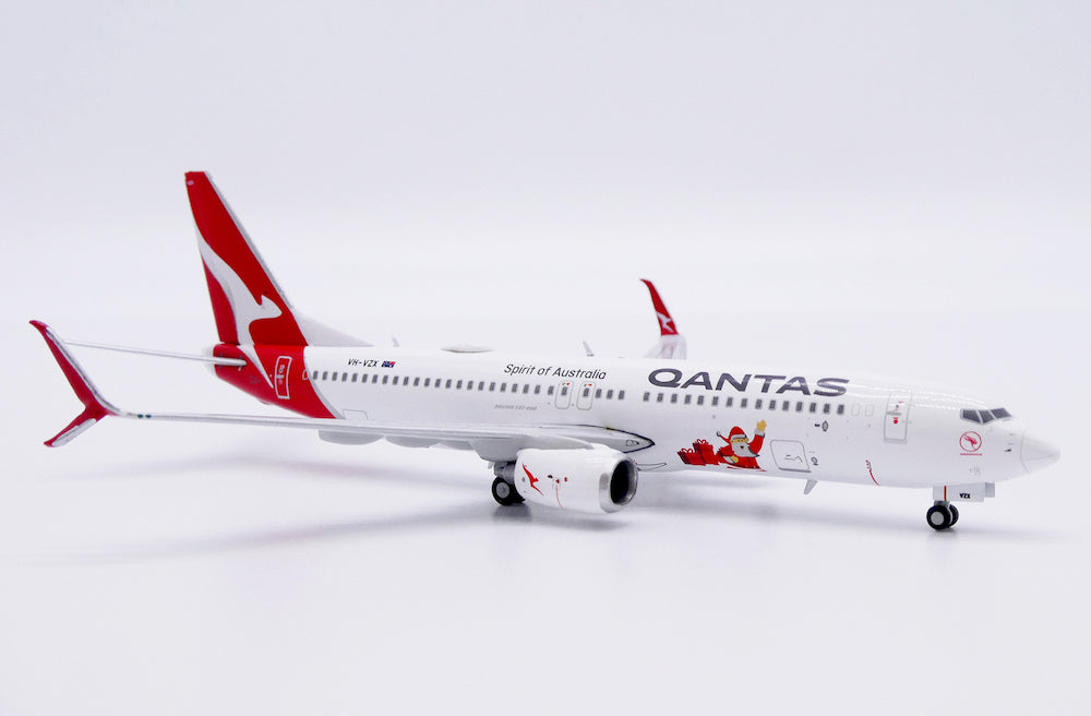 JC WINGS B737-800 QANTAS SANTA REG: VH-VZX