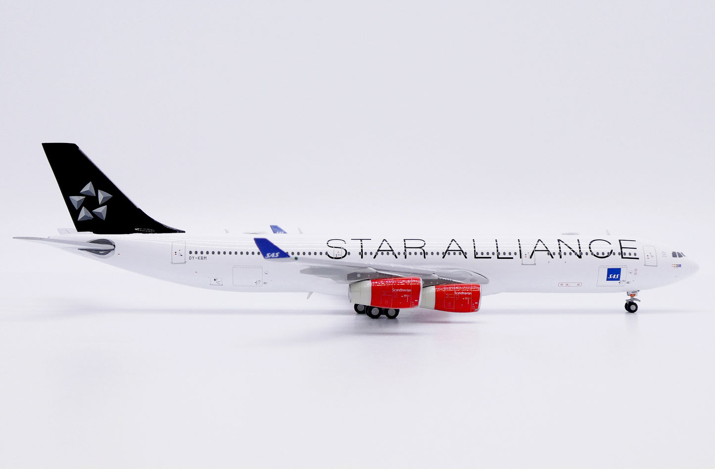 JC WINGS A340-300 SCANDINAVIAN AIRLINES (SAS) "STAR ALLIANCE" REG: OY-KBM