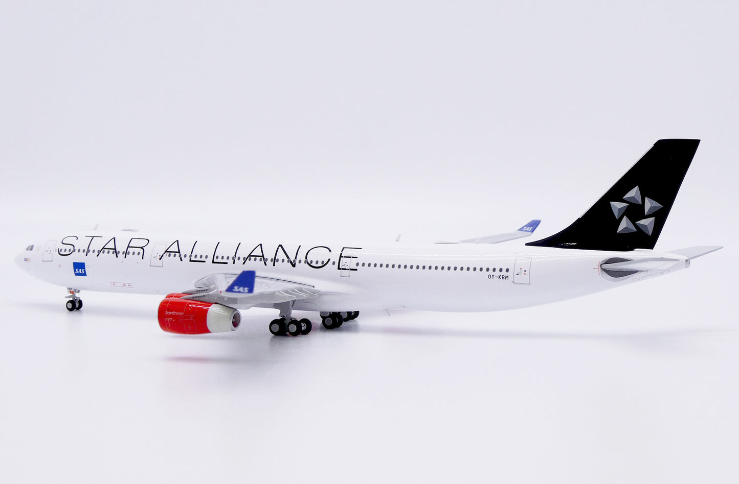 JC WINGS A340-300 SCANDINAVIAN AIRLINES (SAS) "STAR ALLIANCE" REG: OY-KBM