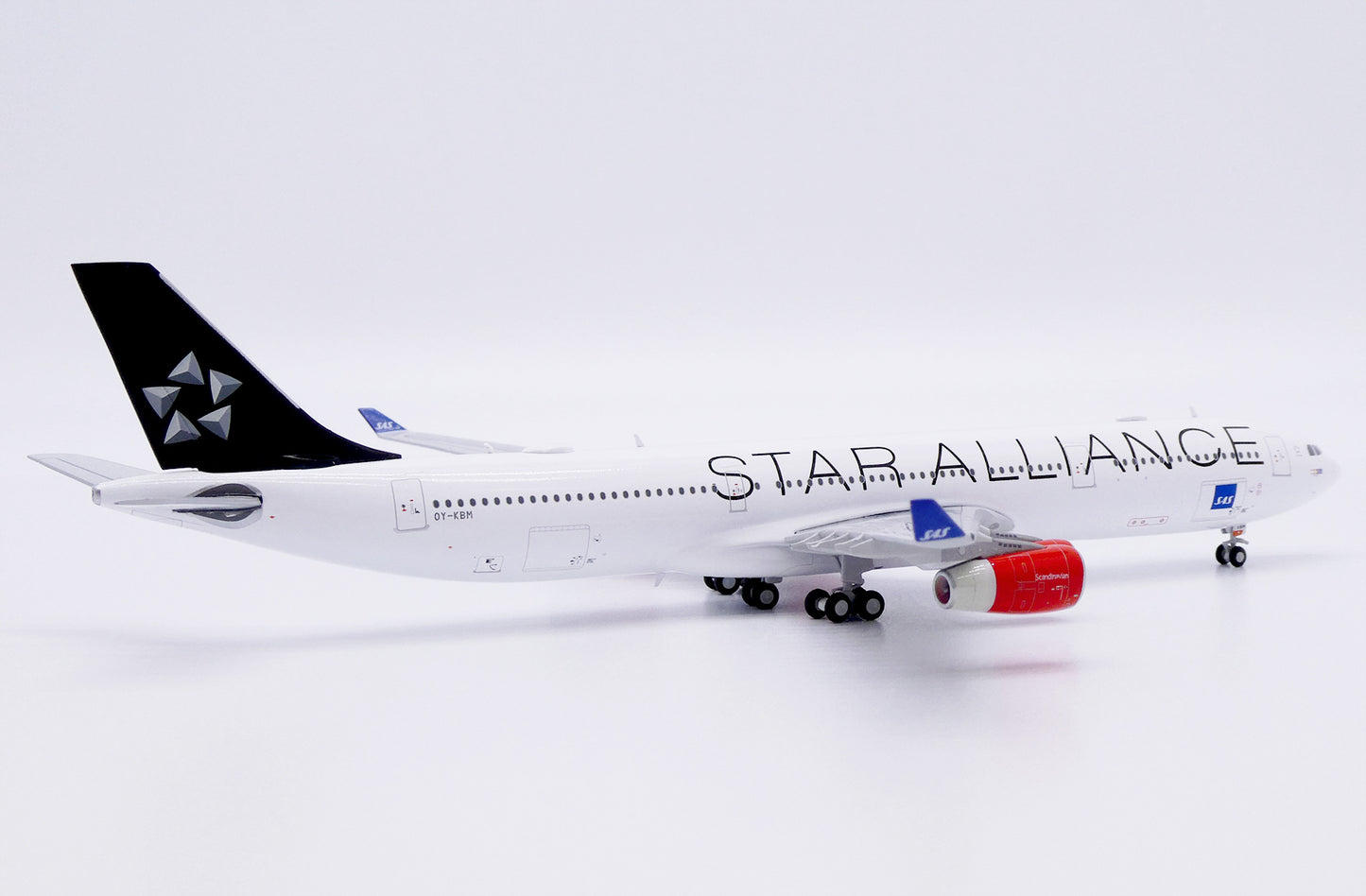 JC WINGS A340-300 SCANDINAVIAN AIRLINES (SAS) "STAR ALLIANCE" REG: OY-KBM