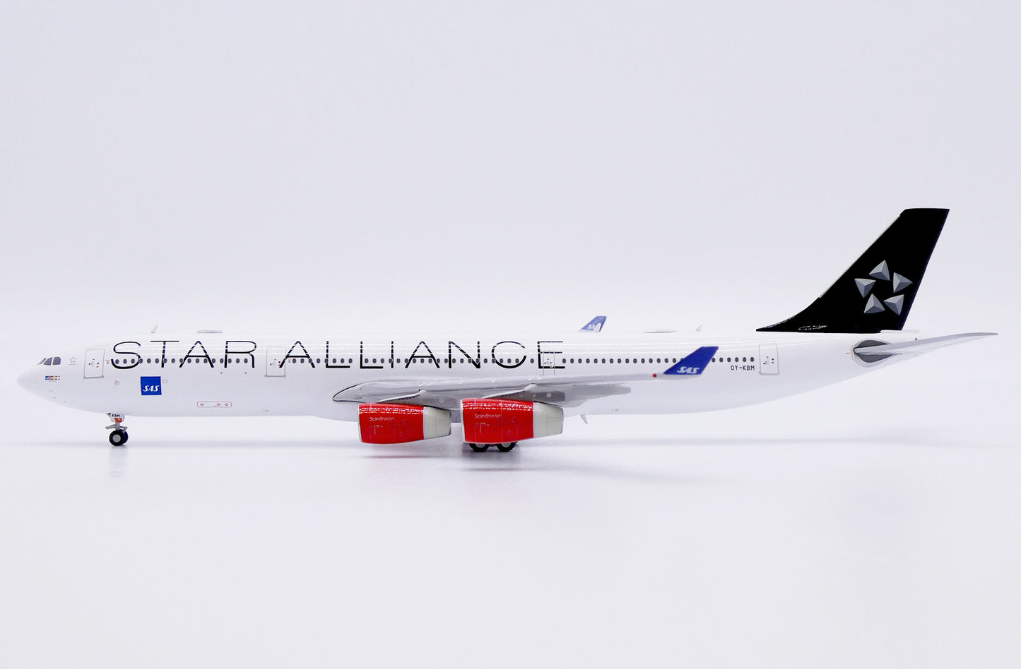 JC WINGS A340-300 SCANDINAVIAN AIRLINES (SAS) "STAR ALLIANCE" REG: OY-KBM