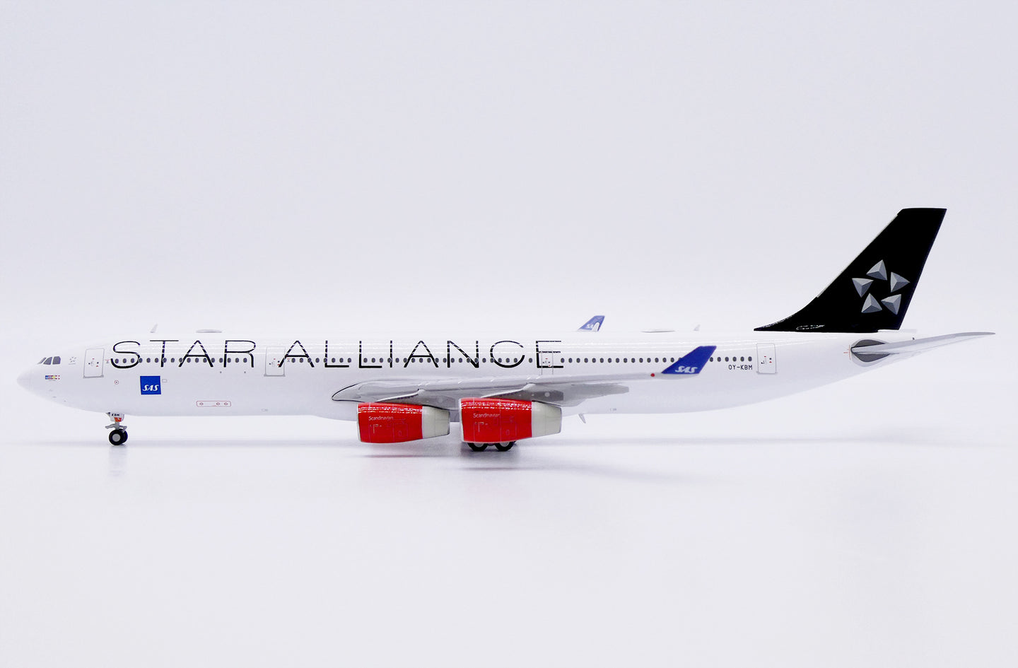 JC WINGS A340-300 SCANDINAVIAN AIRLINES (SAS) "STAR ALLIANCE" REG: OY-KBM