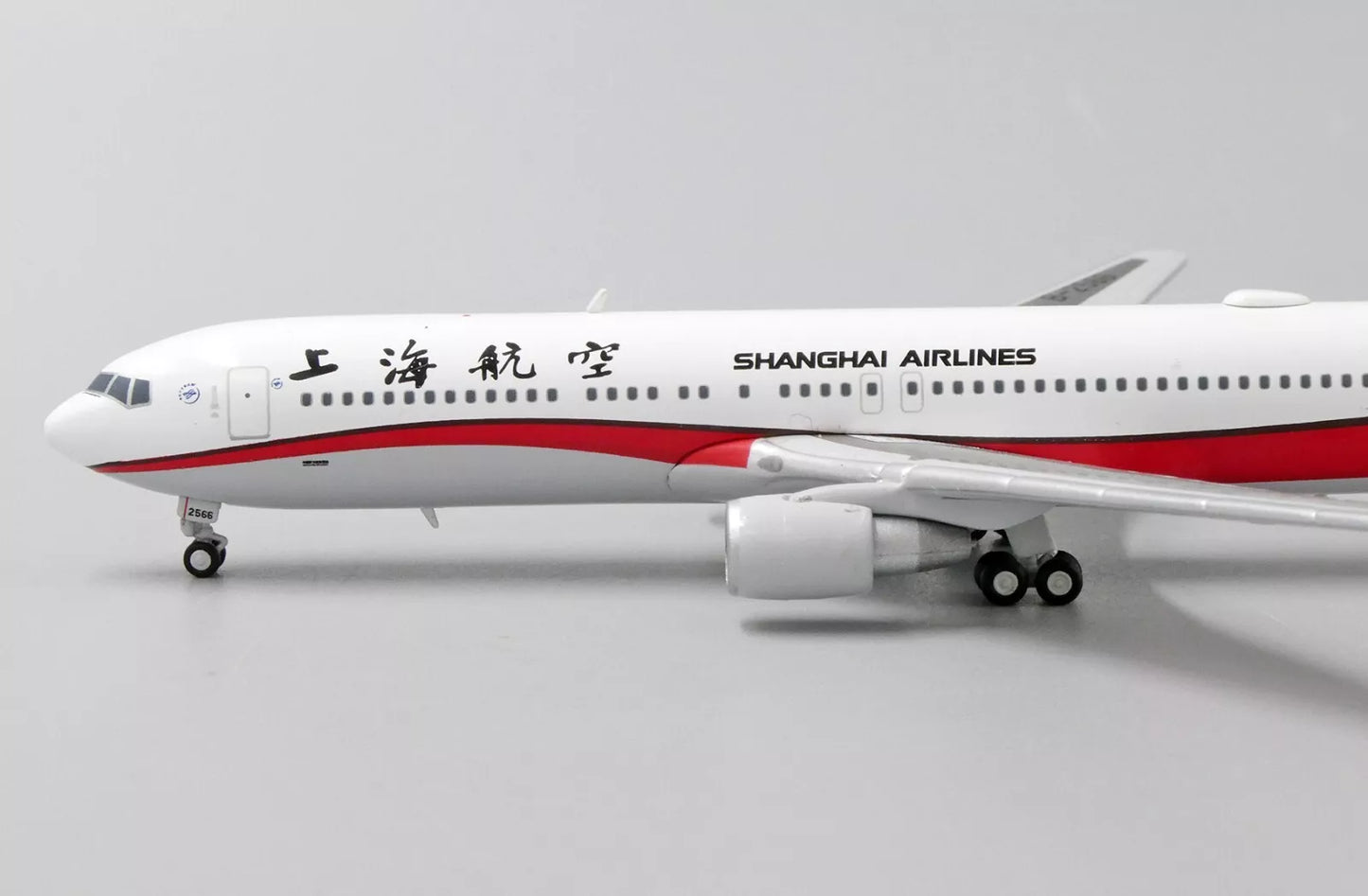 JC WINGS XX4140 1/400 B767-300(ER) SHANGHAI AIRLINES REG: B-2566