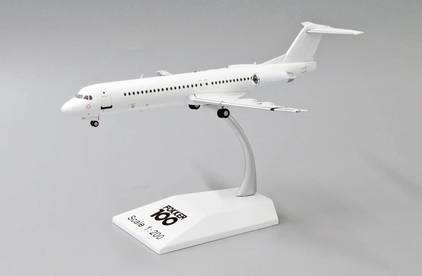 JC WINGS FOKKER 100 BLANK WITH STAND