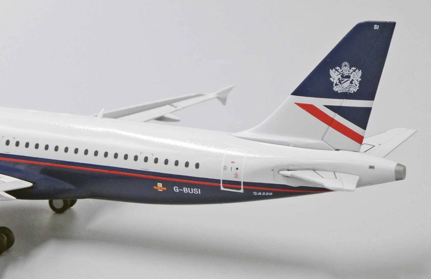 JC WINGS A320 BRITISH AIRWAYS LANDOR REG: G-BUSI