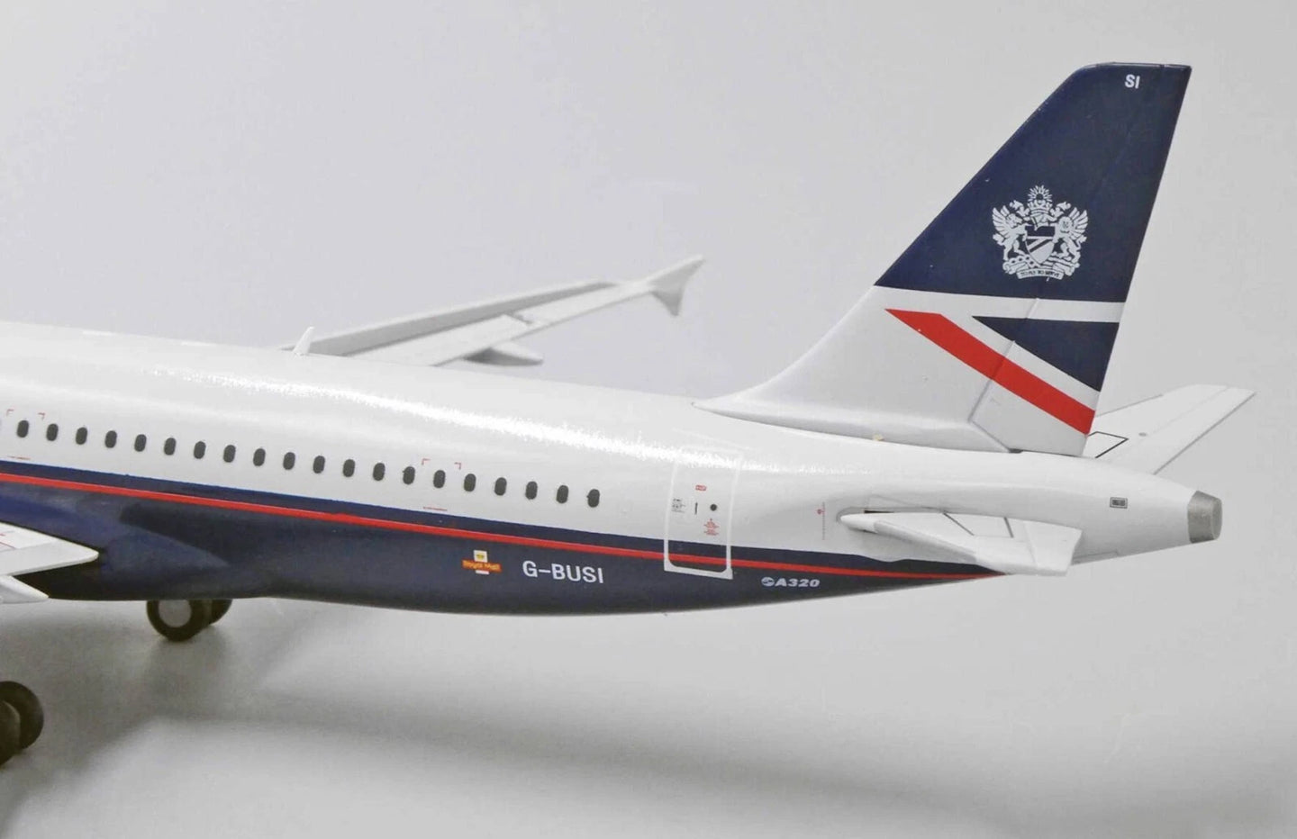 JC WINGS A320 BRITISH AIRWAYS LANDOR REG: G-BUSI