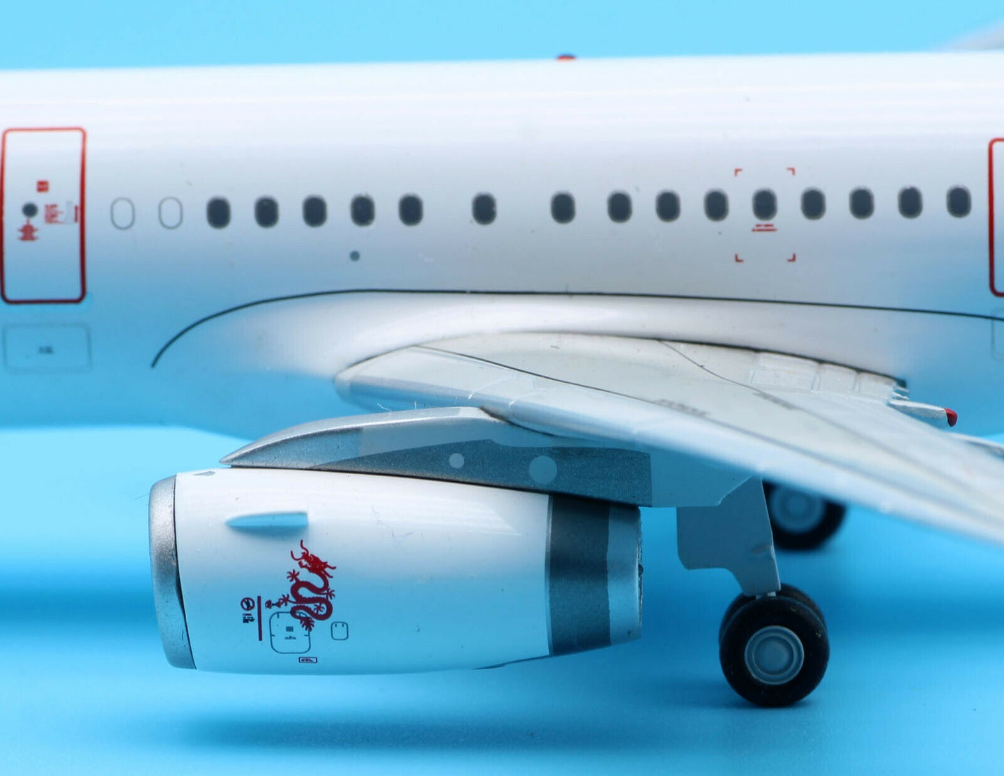 JC WINGS A321 DRAGONAIR "SERVING YOU FOR 25 YEARS" REG: B-HTF