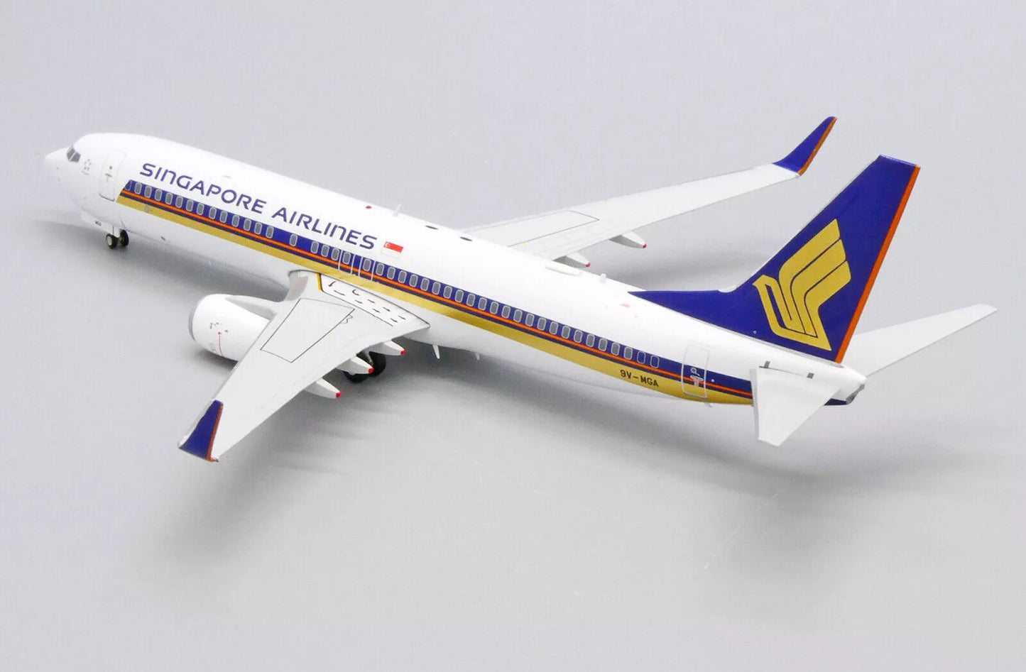 JCWINGS SINGAPORE AIRLINES B737-800 REG: 9V-MGA