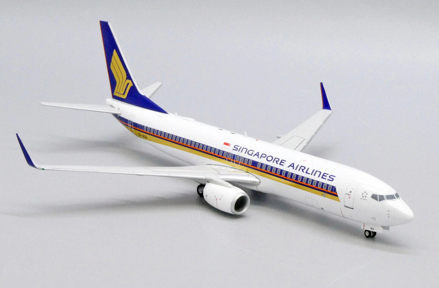 JCWINGS SINGAPORE AIRLINES B737-800 REG: 9V-MGA