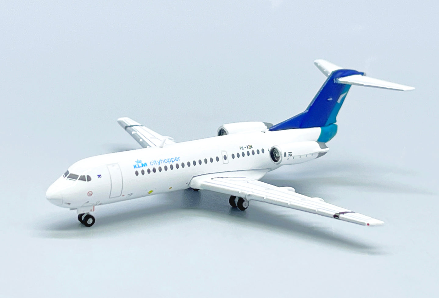 JC WINGS FOKKER 70 KLM CITYHOPPER "SILKAIR HYBRID LIVERY" REG: PH-KZM