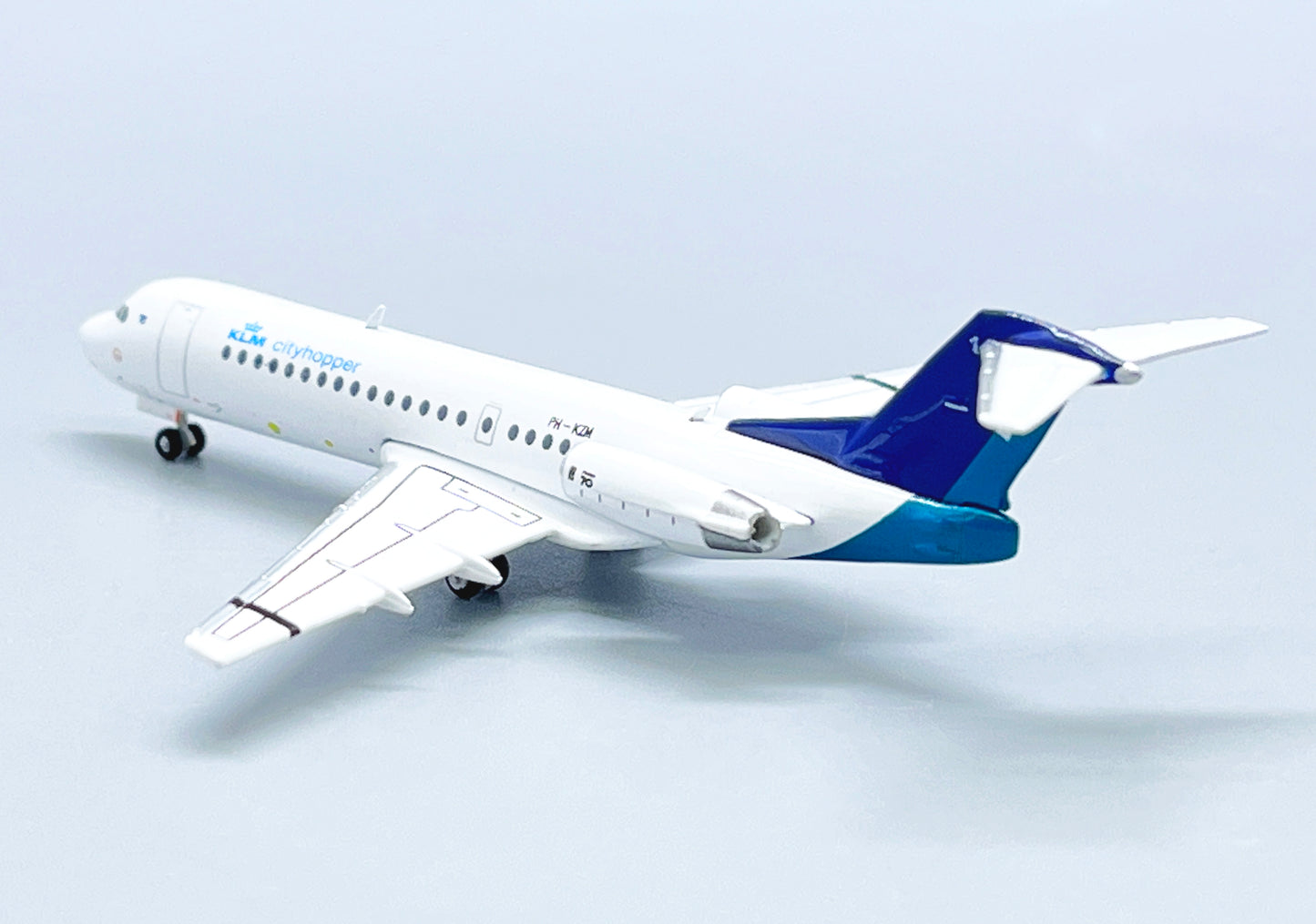 JC WINGS FOKKER 70 KLM CITYHOPPER "SILKAIR HYBRID LIVERY" REG: PH-KZM