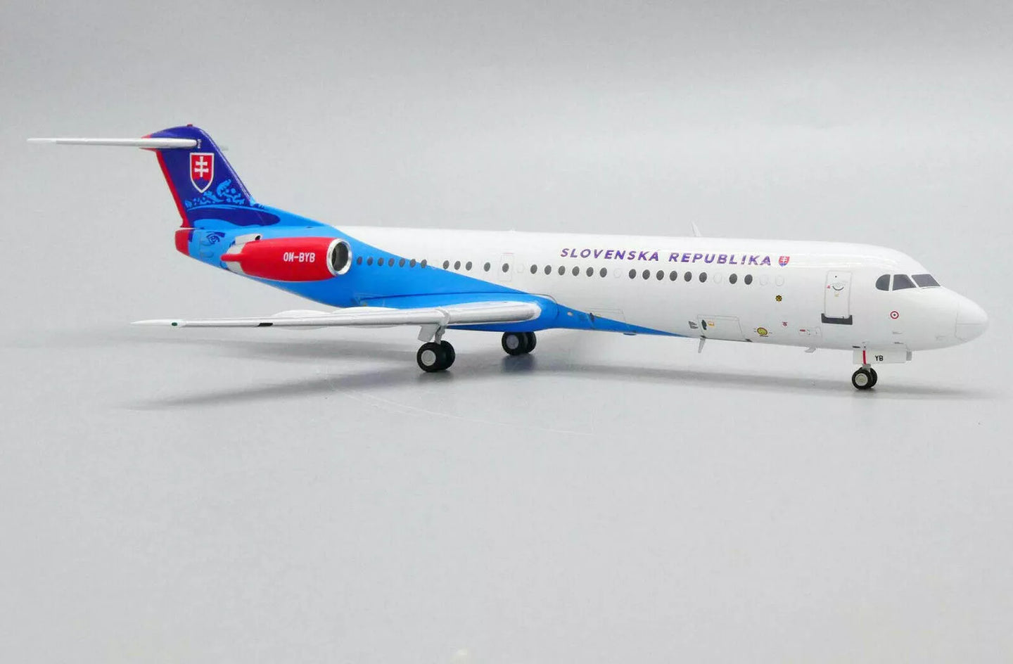 JC WINGS FOKKER 100 SLOVAKIAN FLYING SERVICE REG: OM-BYB