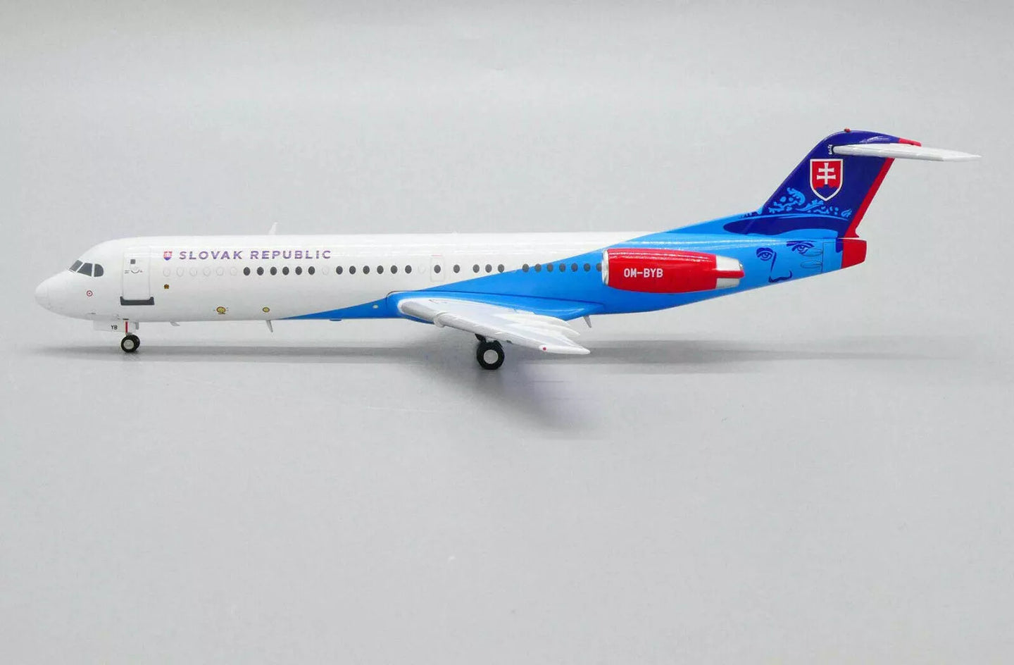 JC WINGS FOKKER 100 SLOVAKIAN FLYING SERVICE REG: OM-BYB