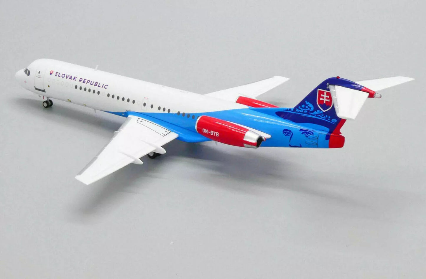 JC WINGS FOKKER 100 SLOVAKIAN FLYING SERVICE REG: OM-BYB