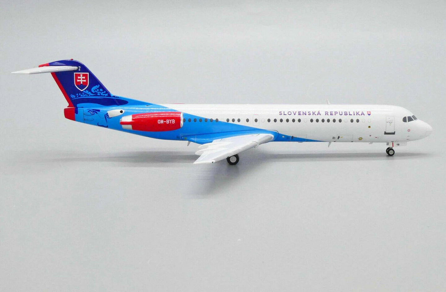 JC WINGS FOKKER 100 SLOVAKIAN FLYING SERVICE REG: OM-BYB