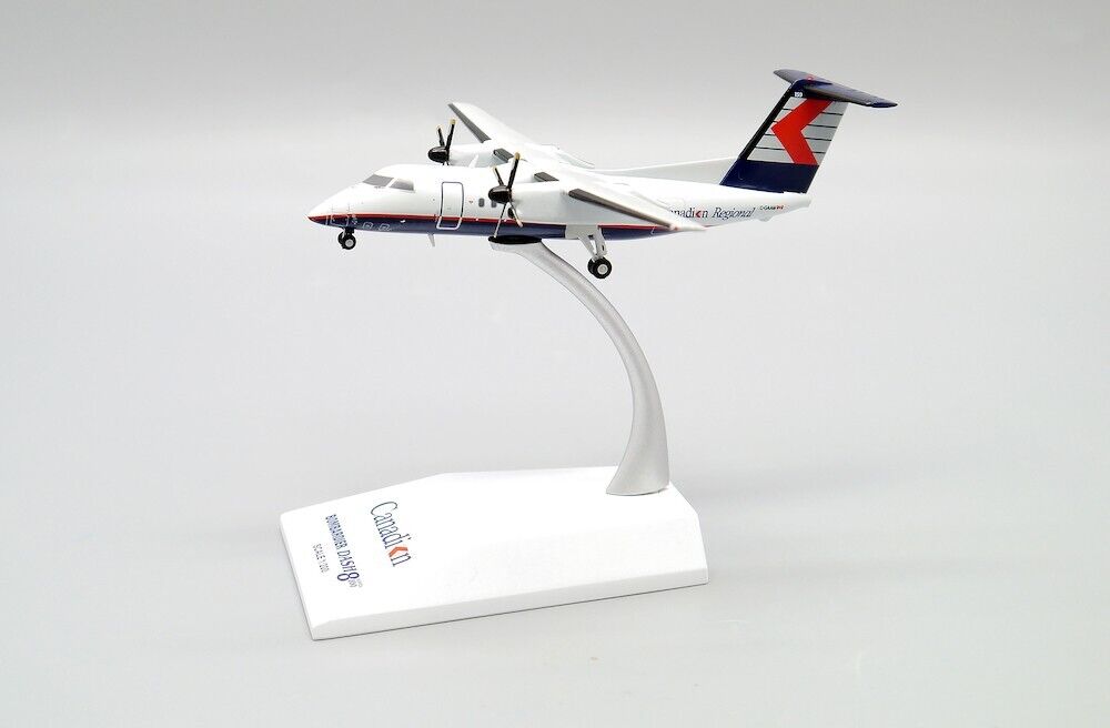 JCWINGS DASH 8-Q102 CRA REG: C-GAAM