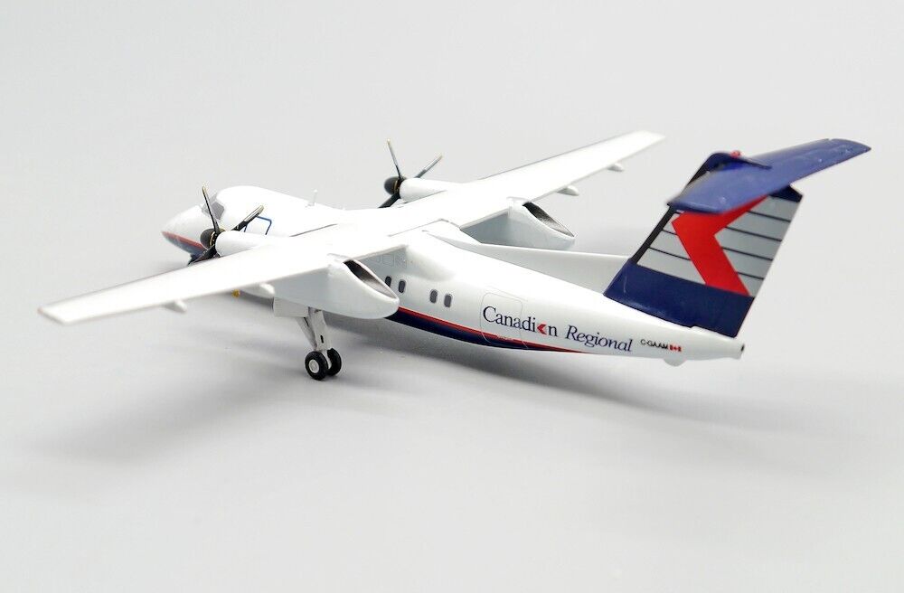 JCWINGS DASH 8-Q102 CRA REG: C-GAAM