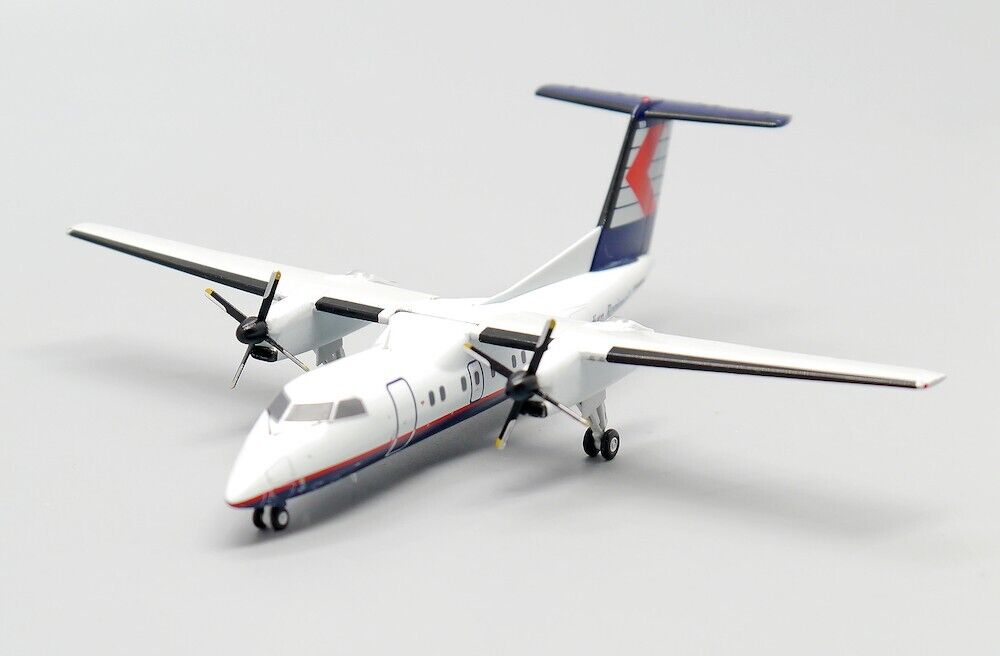 JCWINGS DASH 8-Q102 CRA REG: C-GAAM