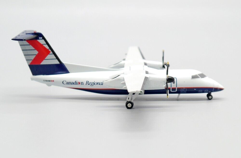 JCWINGS DASH 8-Q102 CRA REG: C-GAAM