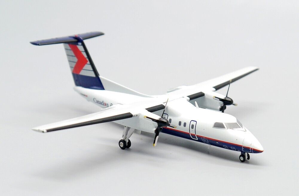 JCWINGS DASH 8-Q102 CRA REG: C-GAAM