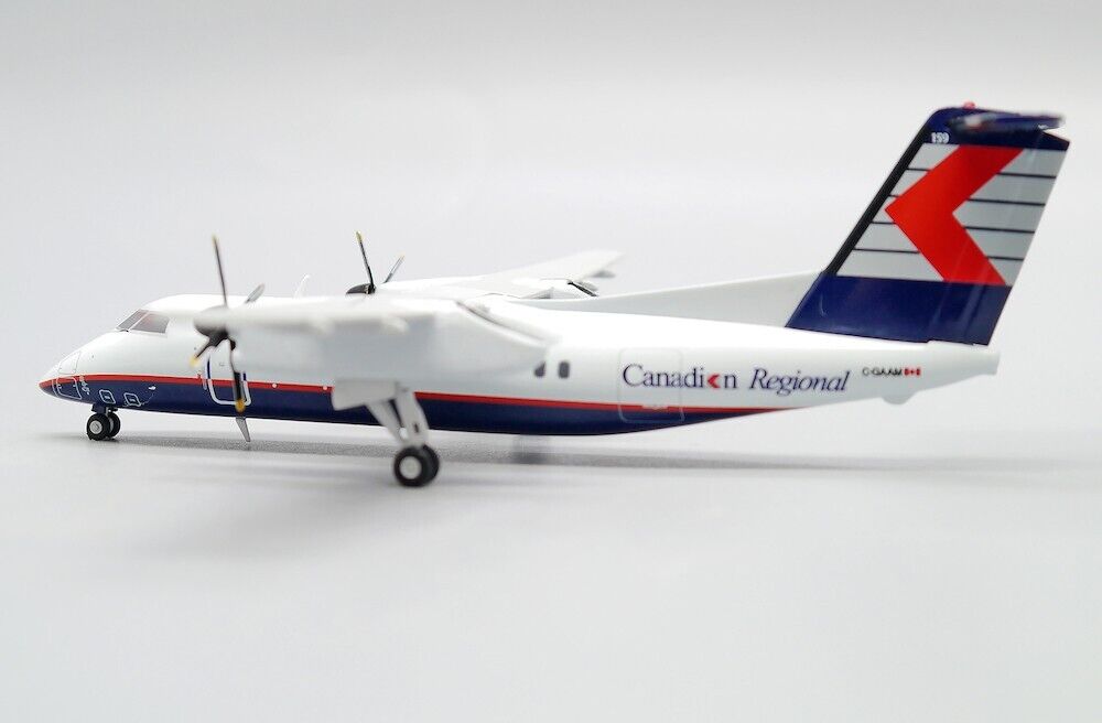 JCWINGS DASH 8-Q102 CRA REG: C-GAAM