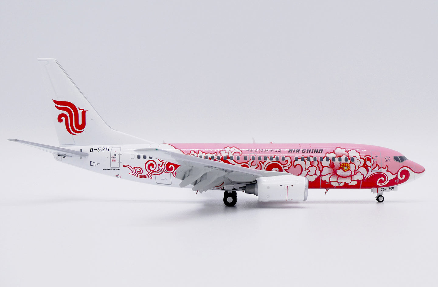 JC WINGS B737-700 AIR CHINA "RED PEONY" (FLAPS DOWN) REG: B-5211