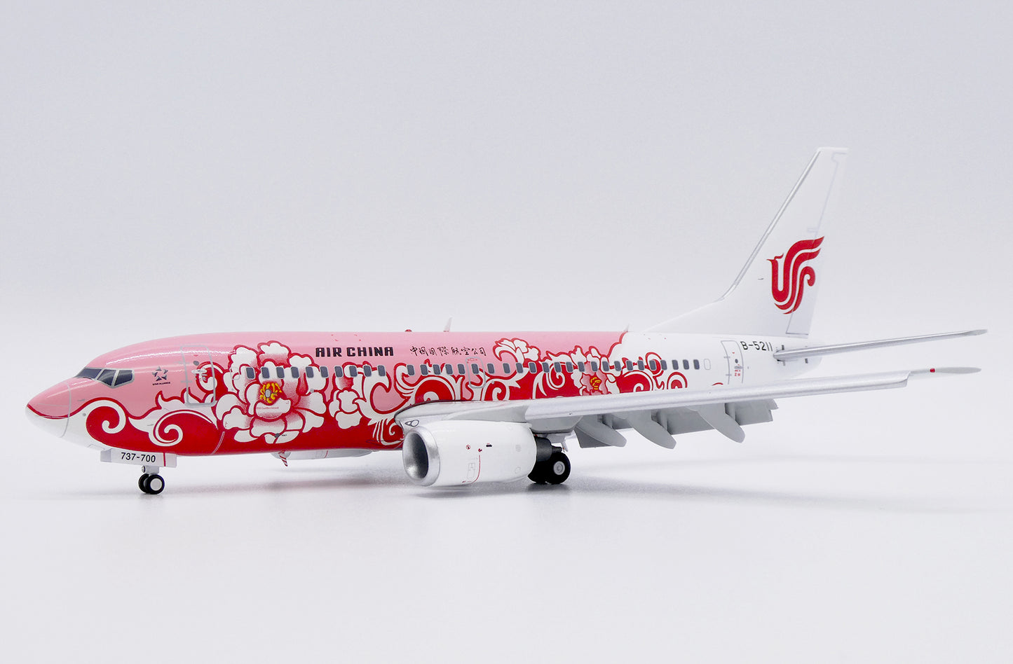 JC WINGS B737-700 AIR CHINA "RED PEONY" (FLAPS DOWN) REG: B-5211